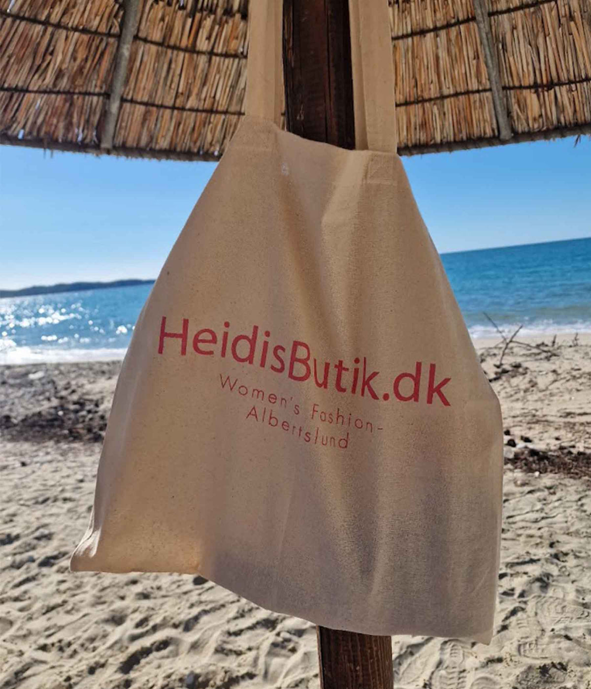 INKØBSNET MED HEIDISBUTIK LOGO PÅ.